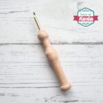 Aguja mágica de madera