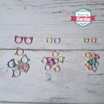Marcadores metálicos en forma de gato de colores (cerrados)