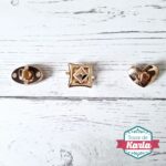 Hebillas o cerraduras metálicas para cartera con figuras
